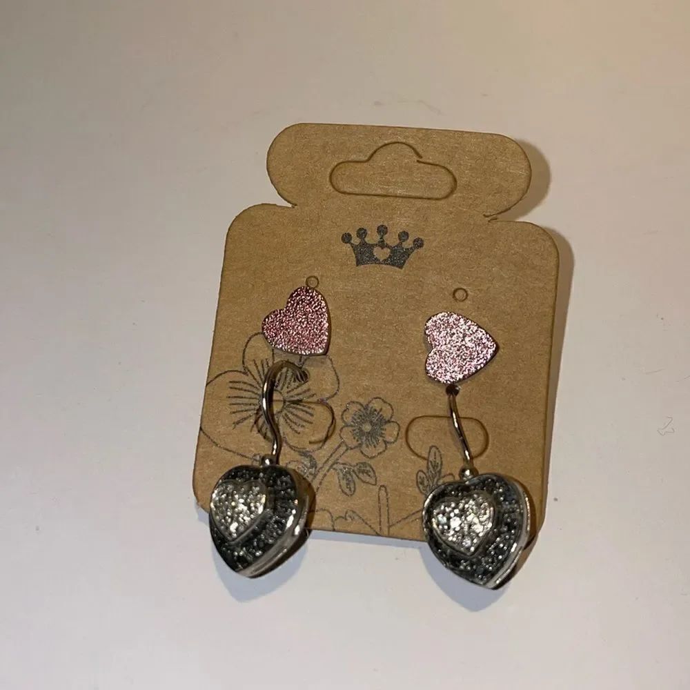 Two sets of heart shaped earrings